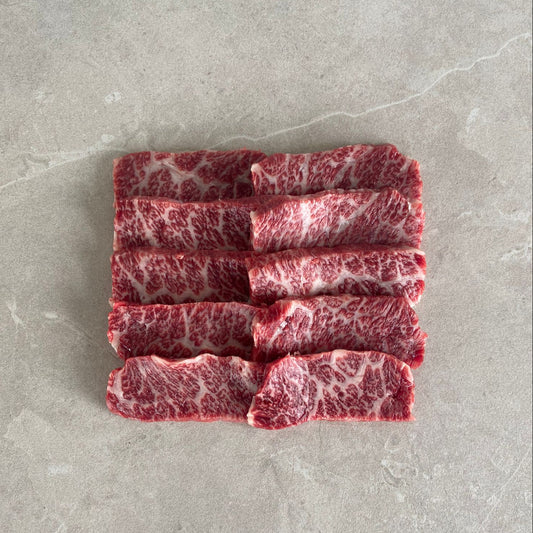 Black origin Wagyu Short rib yakiniku slices arranged on a kitchen bench