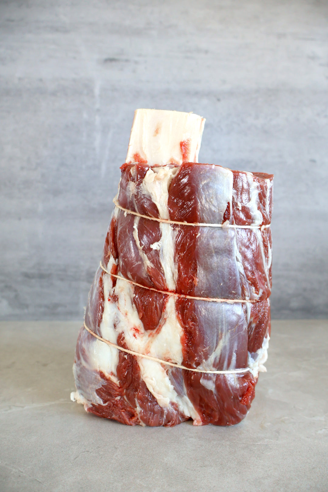 Wagyu beef shank with bone in on a modern kitchen benchtop