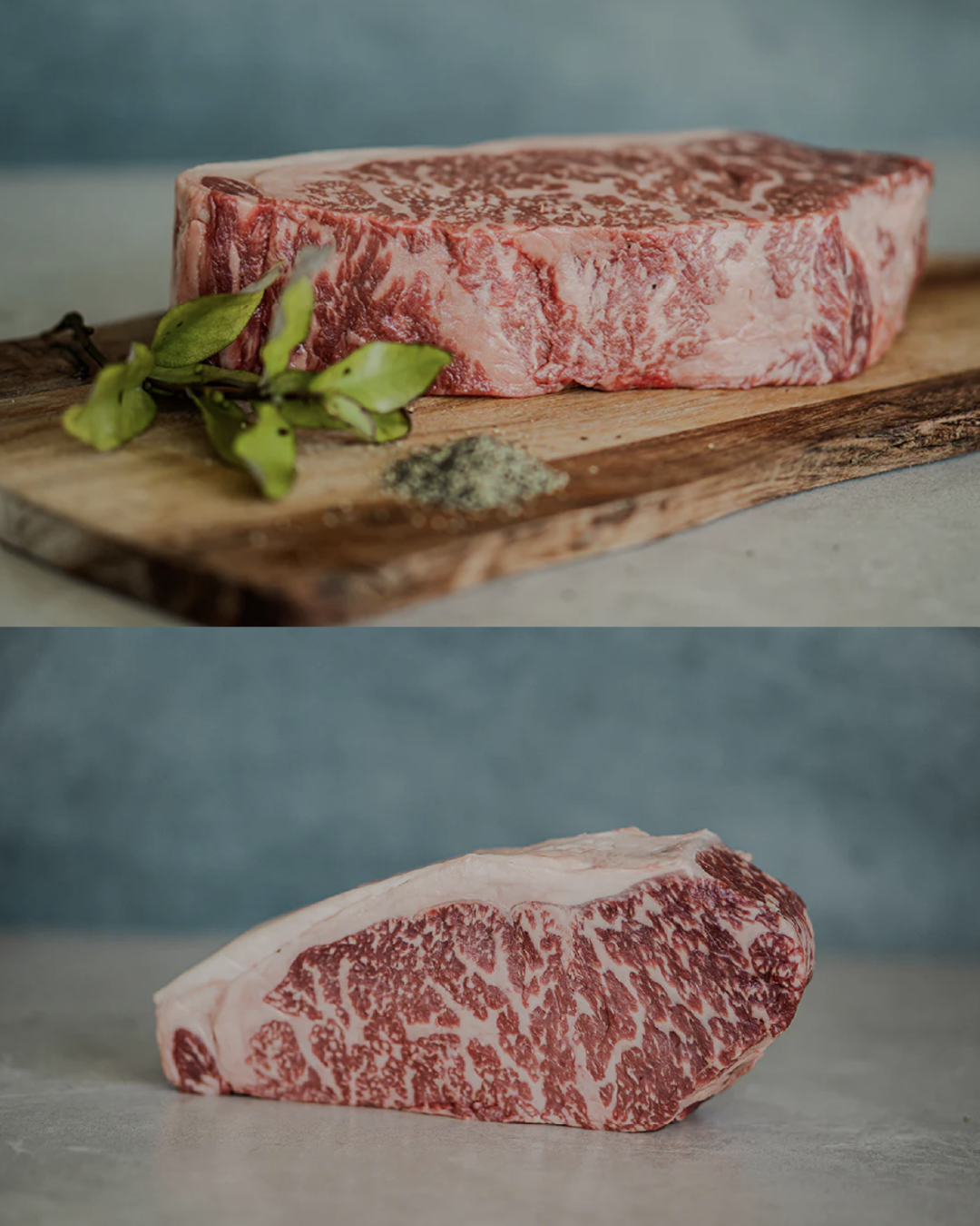 Marbled raw beef on a wooden cutting board with a blurred background